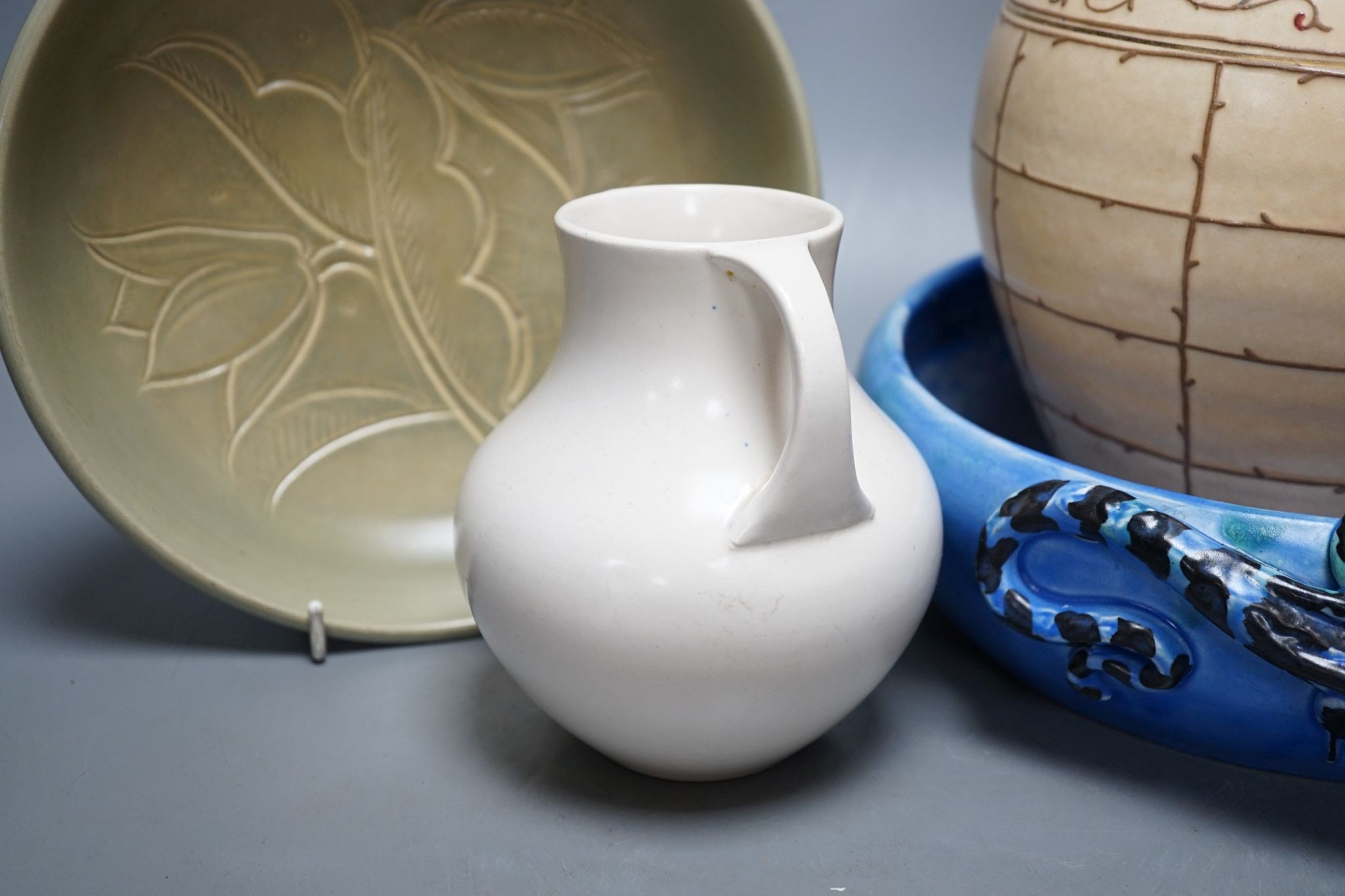 A Charlotte Rhead jug, Moorcroft jug, and 2 bowls